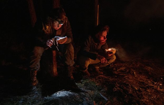 Joan Kovatch and Louis Pommier making fire