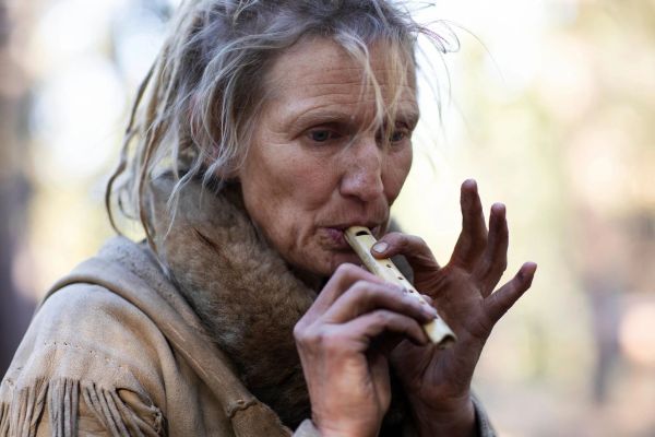 Lynx Vilden plays a bone flute