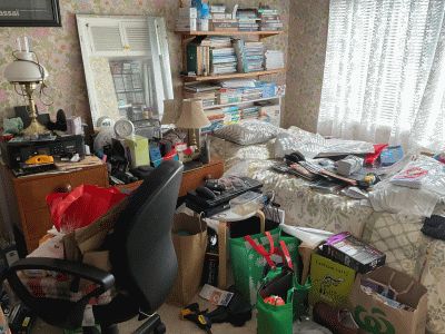 Dad's clutter in my sister's old bedroom