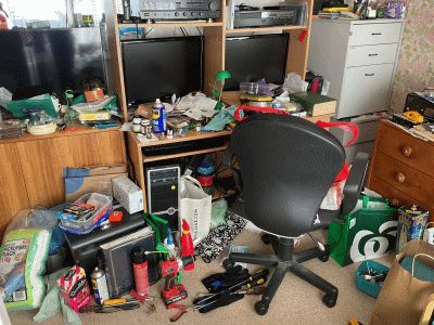 Dad's clutter in my sister's old bedroom