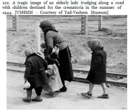 Old woman with children at Auschwitz