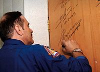 Pavel signs his door