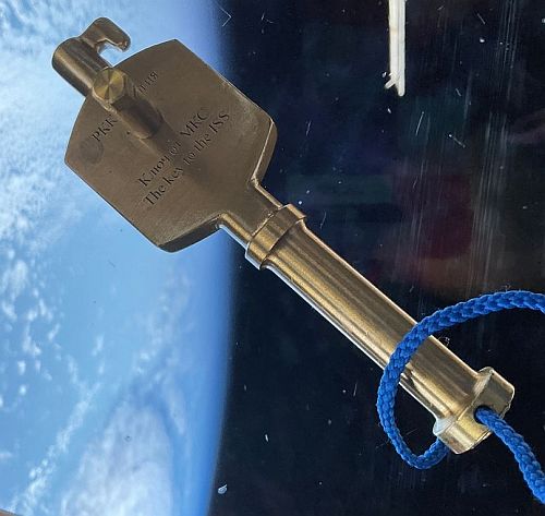Floating ceremonial ISS key